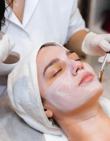 beautician-with-brush-applies-wh
