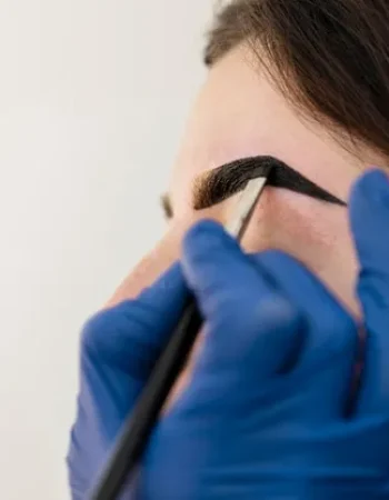 woman-getting-eyebrow-treatment